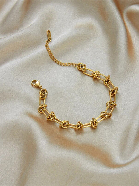 Accent Chain Bracelet – Gilded Steel with Knot Detail