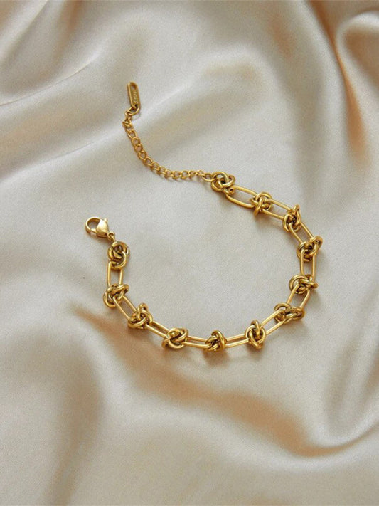Accent Chain Bracelet – Gilded Steel with Knot Detail